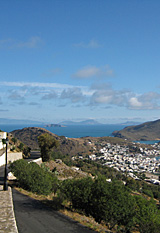 View northwards from near Chora down over Skala, Patmos, Greece, to the islands beyond