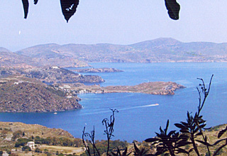 View northwards over the bays towards Meloi and Kambos from below the hilltop Chora village, Patmos, Greek islands, Greece