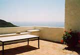 The roof terrace outside the main bedroom of the Village house, looking westwards The roof terrace outside the main bedroom of the Village house, looking westwards